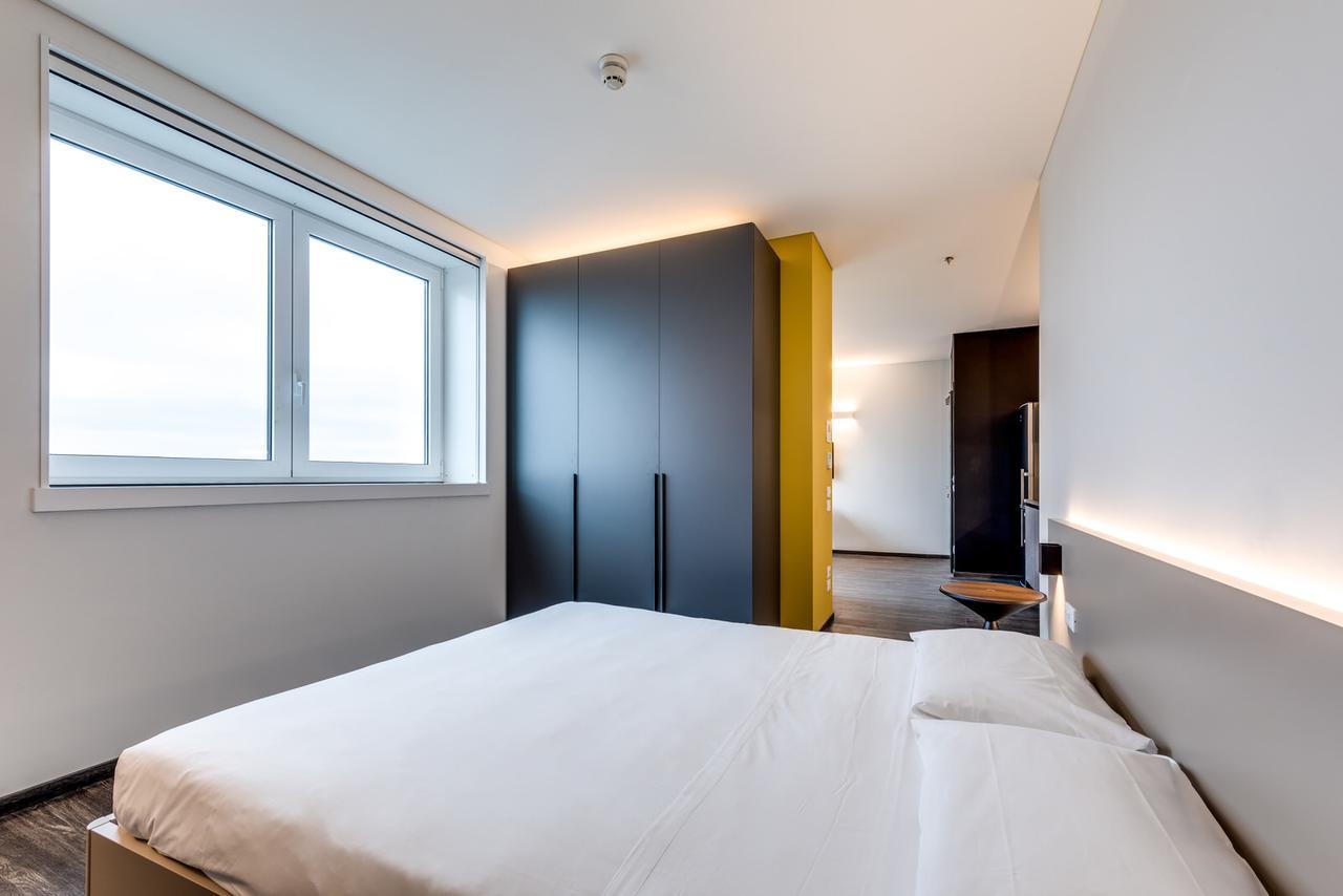 Sky Tower Suite Mestre Bagian luar foto